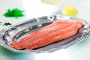 Rainbow trout on a silver tray.