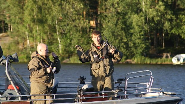 Two fishermen in a boat.