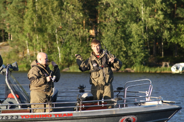 Two fishermen in a boat.